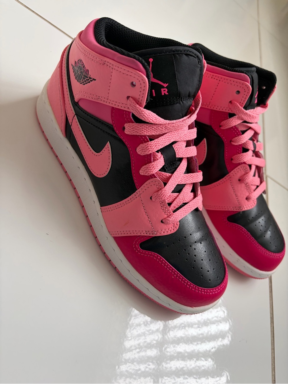 Nike Air Jordan 1 Mid Pink and Black Colorblock Sneakers